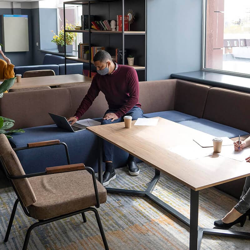 A team member working in a relaxed office space