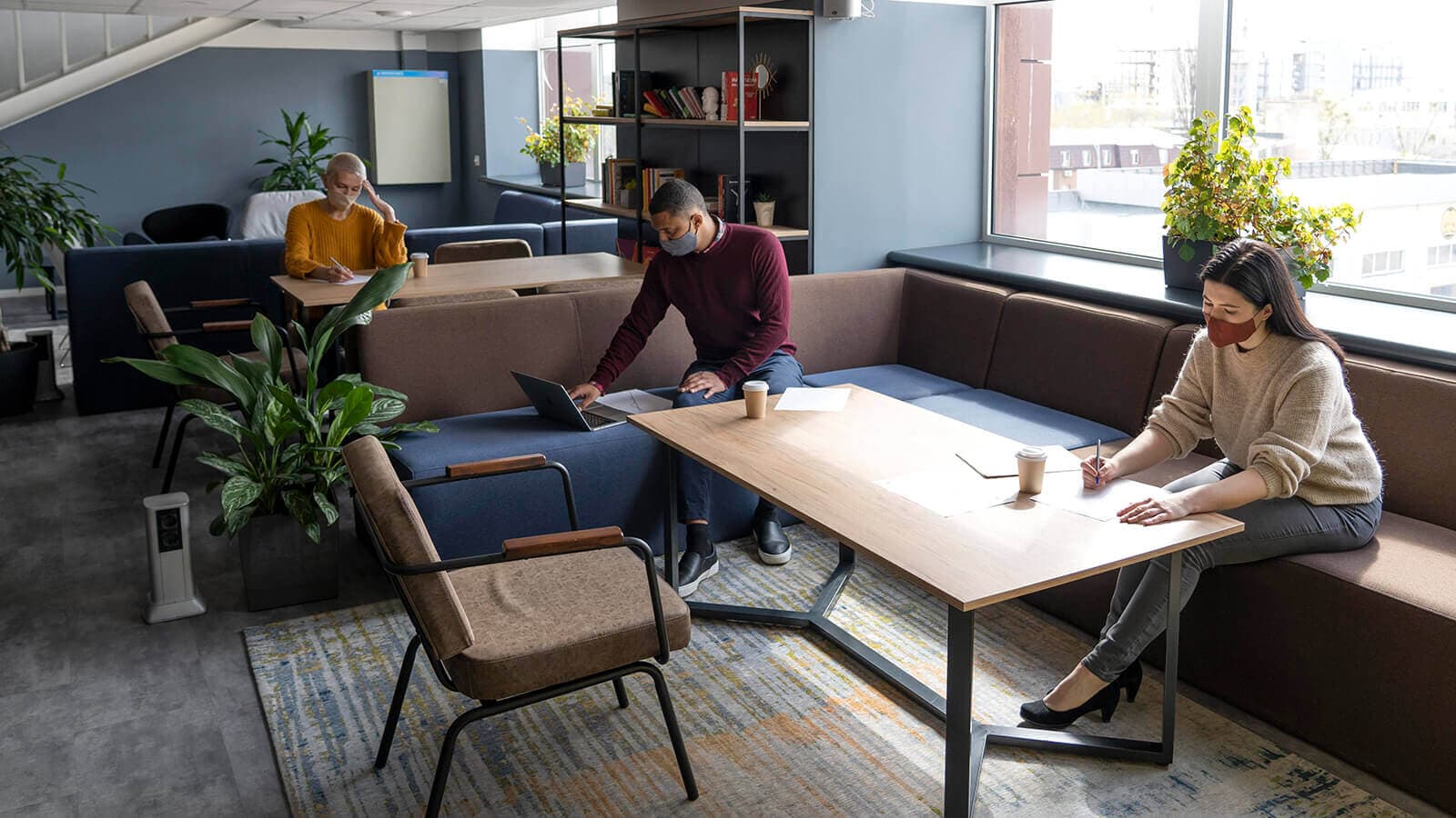 The OPM team working together in a bright office